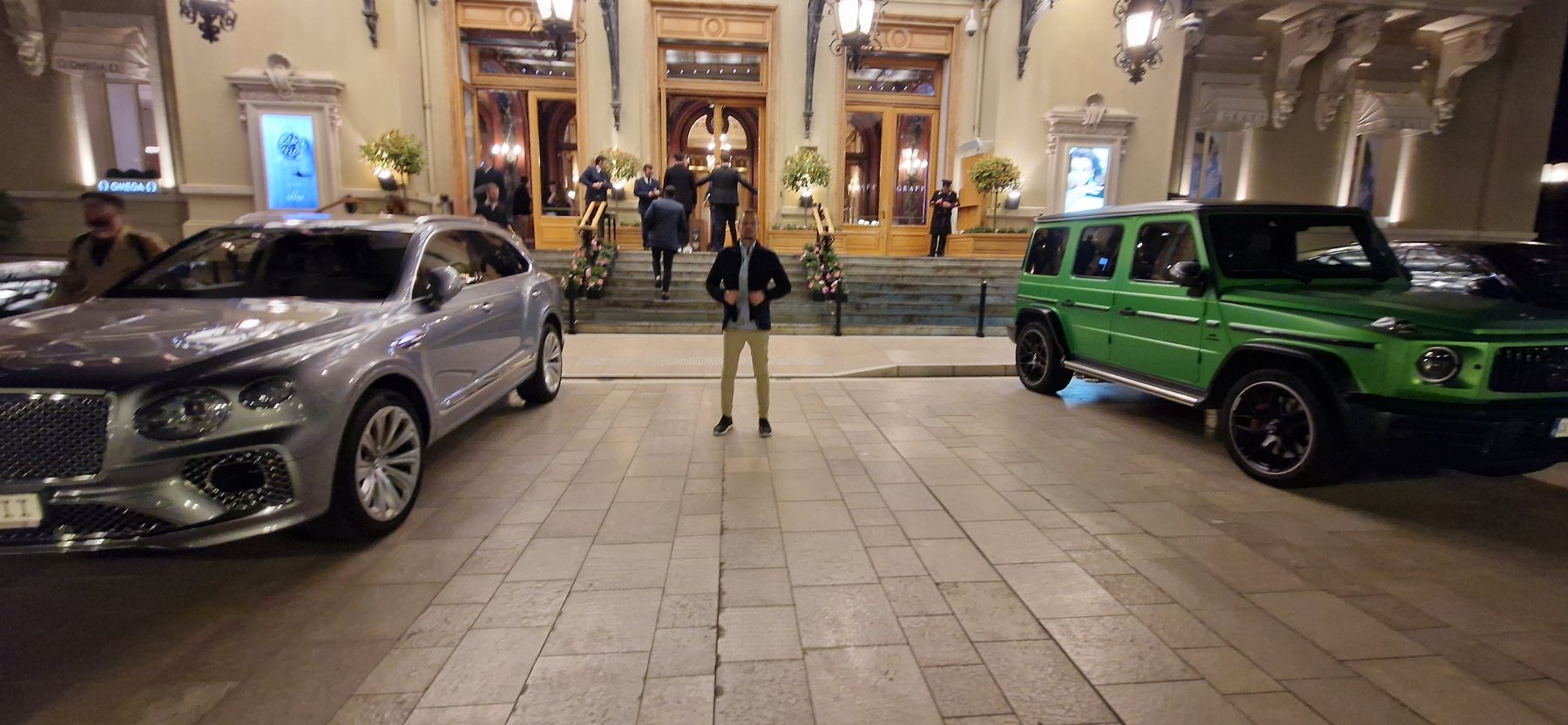 The square in front of the Casino at night, with luxury cars parked